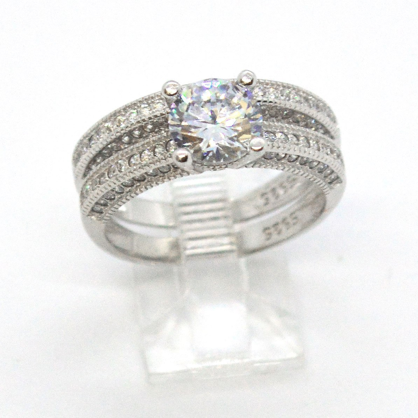 (2-5258-h9) Sterling Silver Women's 2pc Engagement Ring.