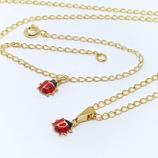 1-6004-h2 Girls Gold Plated Lady Bug Necklace and Bracelet Set.